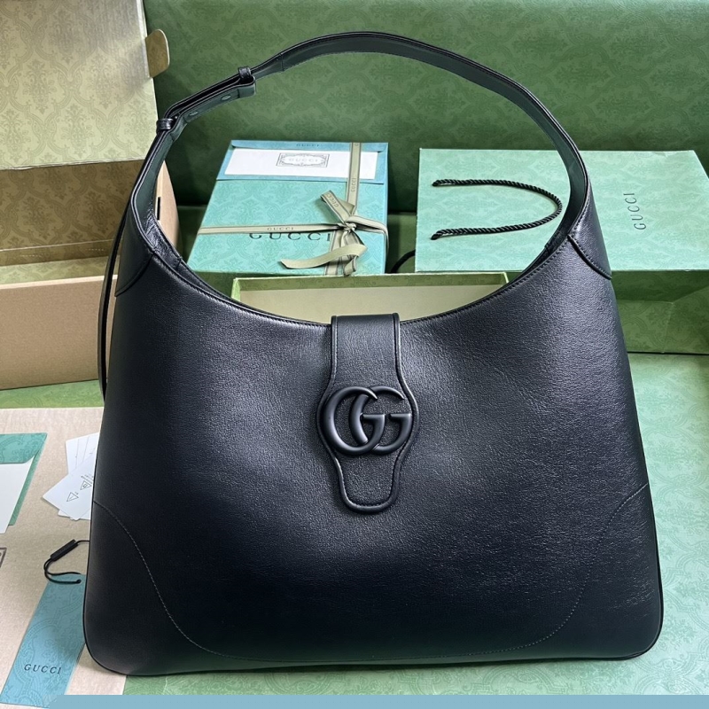 G*u*i top handle bags